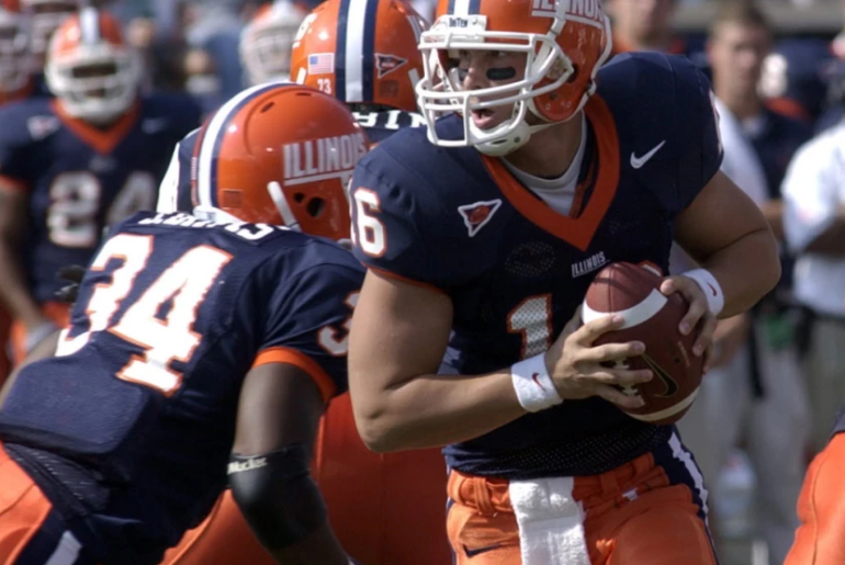 Former Illinois Quarterback Turned Chicago Cop Accused of Stealing Baseball Cards